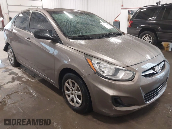 2013 Hyundai Accent GLS with VIN KMHCT4AE2DU486097, listed as a IAAI auction lot 41972806 with 295,949 mi miles. Bid and sale history available at carsss.com. Image 1.