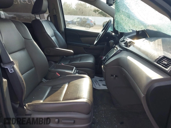 2015 Honda Odyssey EX-L z VIN 5FNRL5H60FB085047, wystawiony jako IAAI lot #42045345 z przebiegiem 180 323 mil mil oraz . Historia ofert i sprzedaży dostępna na DreamBid. Obrazek 5.