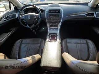 2016 Lincoln MKZ z VIN 3LN6L2G93GR615052, wystawiony jako Copart lot #54717335 z przebiegiem 86 575 mil mil oraz Szkoda całkowita • Salvage title. Historia ofert i sprzedaży dostępna na DreamBid. Obrazek 8.
