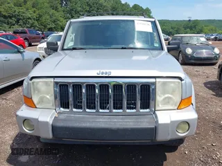 2010 Jeep Commander Sport z VIN 1J4RH4GK1AC148604, wystawiony jako IAAI lot #42518138 z przebiegiem 170 261 mil mil oraz . Historia ofert i sprzedaży dostępna na DreamBid. Obrazek 6.