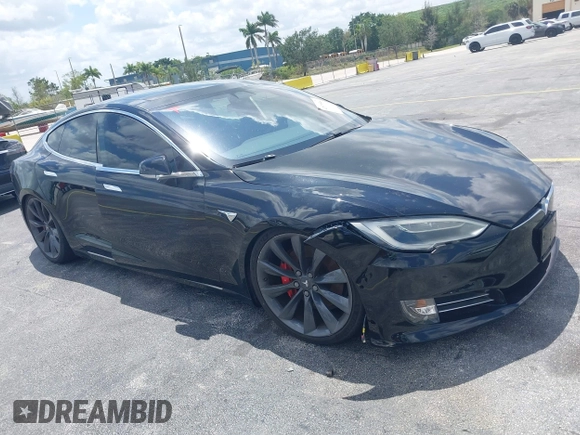 2017 Tesla Model S 100D with VIN 5YJSA1E47HF185734, listed as a IAAI auction lot 42076544 with 56,682 mi miles. Bid and sale history available at carsss.com. Image 1.