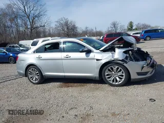 2013 Ford Taurus Limited with VIN 1FAHP2F82DG191141, listed as a IAAI auction lot 41858768 with 172,732 mi miles and . Bid and sale history available at DreamBid. Image 13.