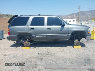 2001 Chevrolet Tahoe LS z VIN 1GNEC13T51J153677, wystawiony jako IAAI lot #42459552 z przebiegiem 201 209 mil mil oraz . Historia ofert i sprzedaży dostępna na DreamBid. Obrazek 13.