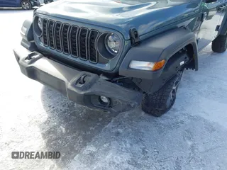 2024 Jeep Wrangler Sport S with VIN 1C4PJXDN2RW306332, listed as a IAAI auction lot 41036573 with 1,785 mi miles and . Bid and sale history available at DreamBid. Image 6.