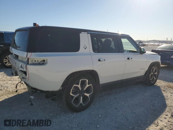 2023 Rivian R1S Adventure with VIN 7PDSGBBA4PN022157, listed as a Copart auction lot 81359984 with 13,522 mi miles and Salvage Title. Bid and sale history available at DreamBid. Image 3.