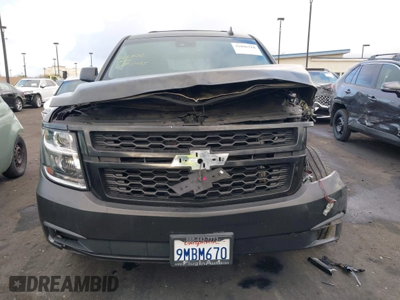 2018 Chevrolet Tahoe LT with VIN 1GNSCBKC5JR126474, listed as a IAAI auction lot 41896310 with 90,928 mi miles and . Bid and sale history available at DreamBid. Image 13.