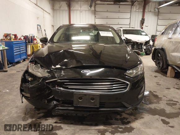2019 Ford Fusion SE with VIN 3FA6P0HD5KR284103, listed as a IAAI auction lot 41477133 with 90,722 mi miles and . Bid and sale history available at carsss.com. Image 12.
