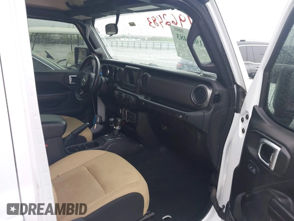 2023 Jeep Wrangler Sport with VIN 1C4HJXDN8PW523532, listed as a IAAI auction lot 41962483 with 14,643 mi miles and . Bid and sale history available at DreamBid. Image 5.