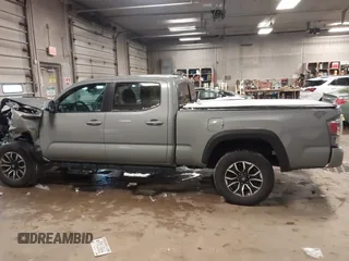 2021 Toyota Tacoma 4WD SR5 with VIN 3TMDZ5BNXMM111204, listed as a IAAI auction lot 41308159 with 46,024 mi miles. Bid and sale history available at carsss.com. Image 14.