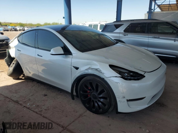 2021 Tesla Model Y Performance z VIN 5YJYGDEF5MF215870, wystawiony jako Copart lot #52531015 z przebiegiem 21 904 mil mil oraz Szkoda całkowita • Salvage title. Historia ofert i sprzedaży dostępna na DreamBid. Obrazek 4.