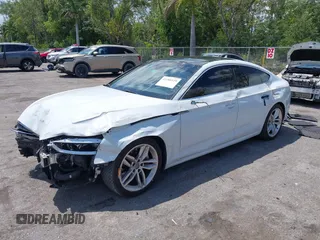 2019 Audi A5 Sportback Premium z VIN WAUANCF56KA080411, wystawiony jako IAAI lot #42208539 z przebiegiem 131 690 mil mil oraz . Historia ofert i sprzedaży dostępna na DreamBid. Obrazek 2.