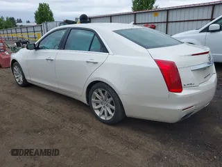 2014 Cadillac CTS Luxury AWD with VIN 1G6AX5S3XE0184524, listed as a IAAI auction lot 42260852 with 139,667 mi miles and . Bid and sale history available at DreamBid. Image 3.