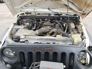 2007 Jeep Wrangler Unlimited X with VIN 1J4GA39147L207549, listed as a Copart auction lot 47291165 with 141,325 mi miles and Salvage title. Bid and sale history available at DreamBid. Image 12.