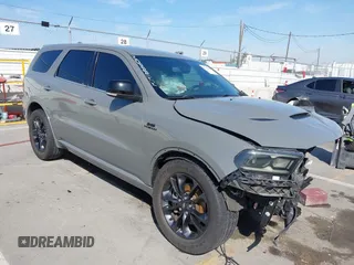 2021 Dodge Durango R/T with VIN 1C4SDHCT9MC573095, listed as a IAAI auction lot 41852401 with 63,492 mi miles and . Bid and sale history available at DreamBid. Image 1.