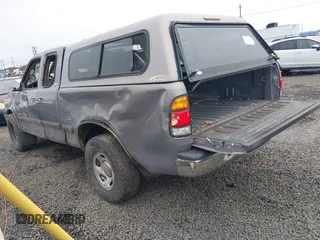 2000 Toyota Tundra SR5 with VIN 5TBRT3414YS086059, listed as a IAAI auction lot 41609962 with 105,030 mi miles and . Bid and sale history available at DreamBid. Image 3.