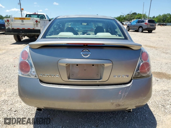 2005 Nissan Altima SE z VIN 1N4BL11D95N451242, wystawiony jako Copart lot #55942315 z przebiegiem 245 942 mil mil oraz Szkoda całkowita • Salvage title. Historia ofert i sprzedaży dostępna na DreamBid. Obrazek 6.