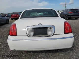 2002 Lincoln Town Car Executive with VIN 1LNHM81W82Y609104, listed as a Copart auction lot 75442374 with 324,612 mi miles and Salvage Title. Bid and sale history available at carsss.com. Image 6.