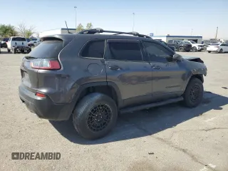 2021 Jeep Cherokee 80th Anniversary with VIN 1C4PJMMX2MD106233, listed as a Copart auction lot 52980415 with 77,979 mi miles and Salvage title. Bid and sale history available at DreamBid. Image 3.