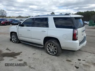 2016 GMC Yukon Denali with VIN 1GKS1CKJ4GR180185, listed as a Copart auction lot 47815835 with 197,506 mi miles and Salvage Title. Bid and sale history available at DreamBid. Image 2.