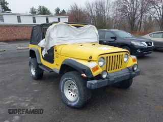 2000 Jeep Wrangler Sport with VIN 1J4FA49S9YP736984, listed as a IAAI auction lot 42055385 with 191,910 mi miles and . Bid and sale history available at DreamBid. Image 6.