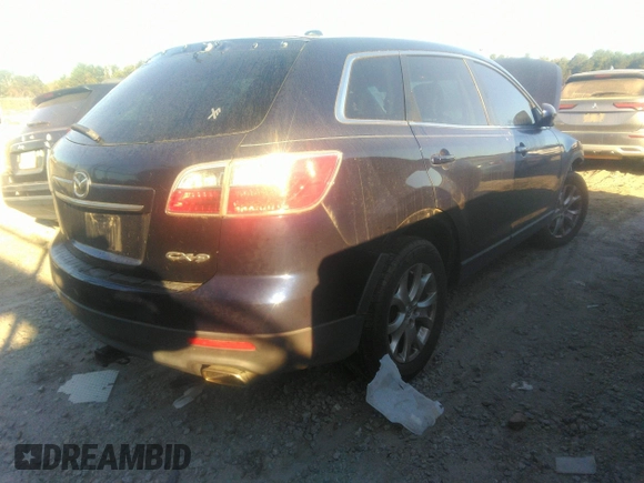 2011 Mazda CX-9 Touring with VIN JM3TB2CA7B0330879, listed as a IAAI auction lot 40628534 with 159,256 mi miles and . Bid and sale history available at DreamBid. Image 4.