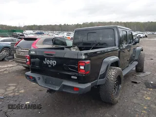 2022 Jeep Gladiator High Altitude z VIN 1C6HJTFG1NL164764, wystawiony jako IAAI lot #41727357 z przebiegiem 28 222 mil mil oraz . Historia ofert i sprzedaży dostępna na DreamBid. Obrazek 4.