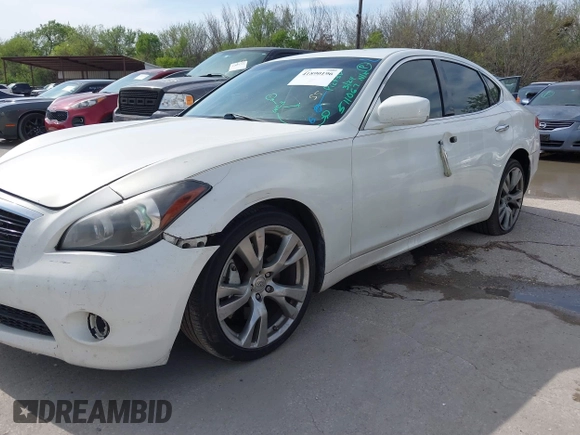 2013 Infiniti M with VIN JN1BY1AP4DM511067, listed as a IAAI auction lot 41890196 with 316,837 mi miles and . Bid and sale history available at DreamBid. Image 18.