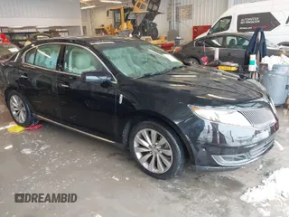 2015 Lincoln MKS with VIN 1LNHL9DK9FG604085, listed as a IAAI auction lot 41251811 with 58,502 mi miles. Bid and sale history available at carsss.com. Image 1.