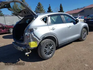 2018 Mazda CX-5 Sport with VIN JM3KFBBM6J0336683, listed as a IAAI auction lot 41737817 with 94,881 mi miles. Bid and sale history available at carsss.com. Image 4.