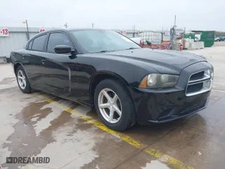 2013 Dodge Charger SE with VIN 2C3CDXBG9DH545916, listed as a IAAI auction lot 41623125 with 169,654 mi miles. Bid and sale history available at carsss.com. Image 1.