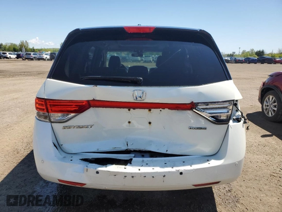 2015 Honda Odyssey Touring Elite with VIN 5FNRL5H92FB504977, listed as a Copart auction lot 56657195 with 189,438 mi miles and Salvage title. Bid and sale history available at DreamBid. Image 6.