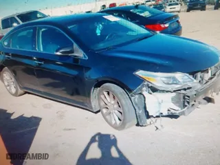 2014 Toyota Avalon Limited with VIN 4T1BK1EB4EU096164, listed as a IAAI auction lot 40904808 with 242,086 mi miles. Bid and sale history available at carsss.com. Image 1.