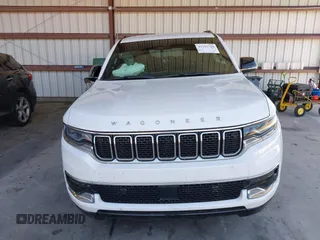 2023 Jeep Grand Wagoneer with VIN 1C4SJUAT5PS509425, listed as a IAAI auction lot 41765704 with 65,656 mi miles and . Bid and sale history available at DreamBid. Image 12.