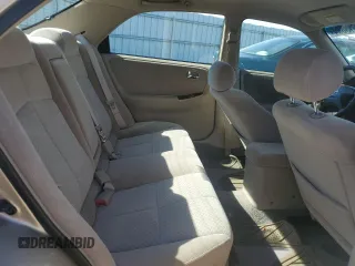 2001 Mazda 626 LX with VIN 1YVGF22C815231985, listed as a Copart auction lot 74913884 with 52,699 mi miles and Clean Title. Bid and sale history available at carsss.com. Image 10.