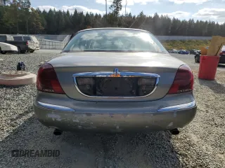 2000 Lincoln Continental with VIN 1LNHM97VXYY878511, listed as a Copart auction lot 78262834 with 143,824 mi miles and Salvage Title. Bid and sale history available at carsss.com. Image 6.
