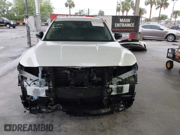 2024 Mazda CX-50 S Premium with VIN 7MMVABDM8RN185958, listed as a IAAI auction lot 41706138 with 17,397 mi miles and . Bid and sale history available at DreamBid. Image 13.