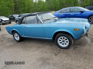1974 FIAT 124 Spider z VIN 124CS10081683, wystawiony jako Copart lot #58650195 z przebiegiem 143 647 mil mil oraz Czysty tytuł • Clean title. Historia ofert i sprzedaży dostępna na DreamBid. Obrazek 4.