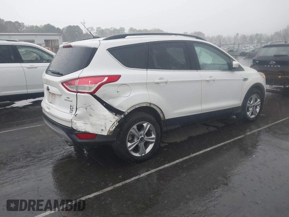 2016 Ford Escape SE with VIN 1FMCU0GX4GUC23998, listed as a IAAI auction lot 41917522 with 96,491 mi miles and . Bid and sale history available at carsss.com. Image 4.