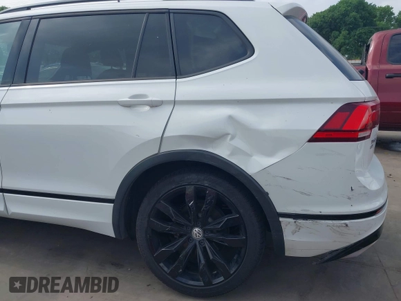 2021 Volkswagen Tiguan SE with VIN 3VV3B7AX9MM003432, listed as a IAAI auction lot 41914477 with 64,530 mi miles and . Bid and sale history available at DreamBid. Image 6.