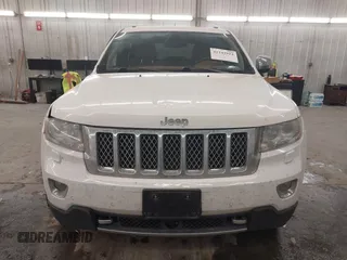 2013 Jeep Grand Cherokee Overland with VIN 1C4RJFCG7DC581808, listed as a IAAI auction lot 41242922 with 187,442 mi miles. Bid and sale history available at carsss.com. Image 13.