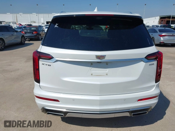 2020 Cadillac XT6 FWD Premium Luxury z VIN 1GYKPERS1LZ103976, wystawiony jako IAAI lot #41679005 z przebiegiem 57 249 mil mil oraz . Historia ofert i sprzedaży dostępna na DreamBid. Obrazek 17.