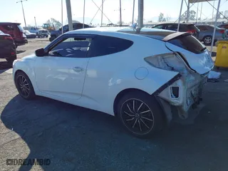 2015 Hyundai Veloster with VIN KMHTC6AD3FU227852, listed as a IAAI auction lot 41657406 with 179,185 mi miles. Bid and sale history available at carsss.com. Image 3.