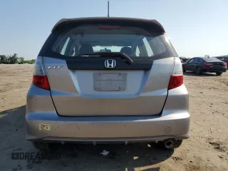 2010 Honda Fit Sport with VIN JHMGE8H47AS023964, listed as a Copart auction lot 61797995 with 78,518 mi miles and Salvage title. Bid and sale history available at DreamBid. Image 6.