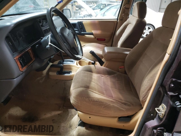 1997 Jeep Grand Cherokee Laredo with VIN 1J4GZ58S6VC573007, listed as a Copart auction lot 42728355 with 164,269 mi miles and Salvage Title. Bid and sale history available at carsss.com. Image 7.