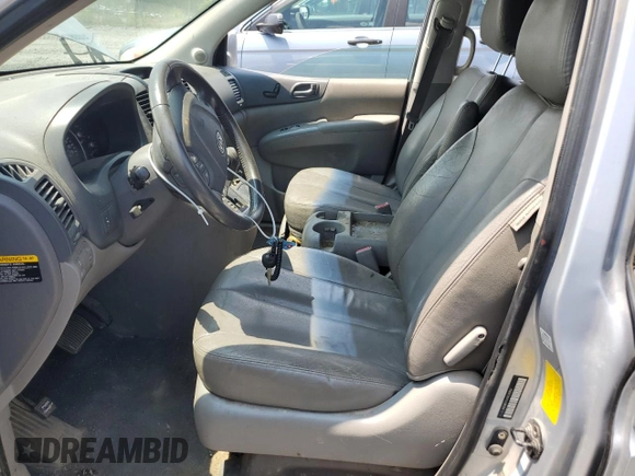 2009 Kia Sedona LX with VIN KNDMB233096296810, listed as a Copart auction lot 64614694 with 231,572 mi miles and Salvage Title. Bid and sale history available at carsss.com. Image 7.