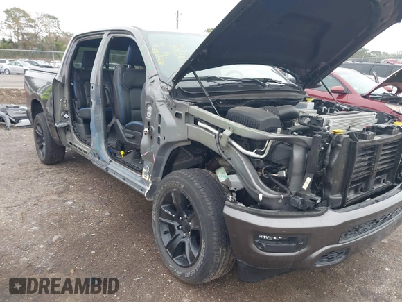 2023 Ram 1500 Big Horn z VIN 1C6SRFFT5PN654063, wystawiony jako IAAI lot #41655131 z przebiegiem 24 012 mil mil oraz . Historia ofert i sprzedaży dostępna na DreamBid. Obrazek 6.