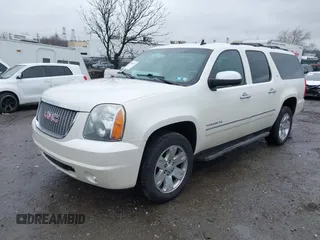 2012 GMC Yukon XL SLT with VIN 1GKS2KE77CR205341, listed as a IAAI auction lot 41565367 with 165,500 mi miles. Bid and sale history available at carsss.com. Image 17.