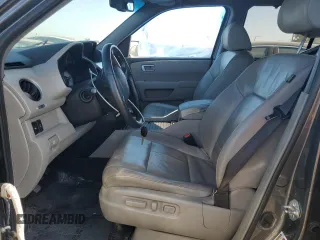2011 Honda Pilot Touring z VIN 5FNYF4H94BB046303, wystawiony jako Copart lot #58017515 z przebiegiem 118 384 mil mil oraz Szkoda całkowita • Salvage title. Historia ofert i sprzedaży dostępna na DreamBid. Obrazek 7.