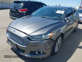 2014 Ford Fusion SE Hybrid with VIN 3FA6P0LU9ER142204, listed as a IAAI auction lot 41964308 with 177,499 mi miles. Bid and sale history available at carsss.com. Image 2.