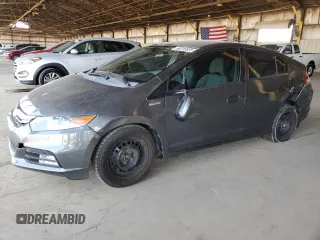 2012 Honda Insight z VIN JHMZE2H38CS004159, wystawiony jako Copart lot #60316925 z przebiegiem 142 601 mil mil oraz Szkoda całkowita • Salvage title. Historia ofert i sprzedaży dostępna na DreamBid. Obrazek 1.